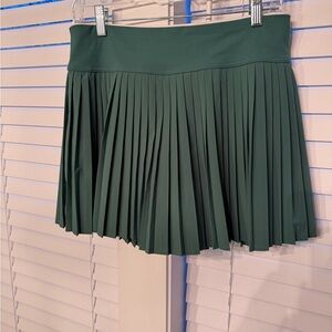 Pleated Mini Golf/Tennis Skirt in Green with shorts underneath